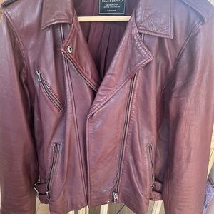 100% genuine leather moto jacket. Size xl fits like a large.